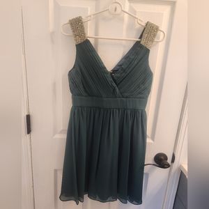 Emerald colored dress with rhinestones